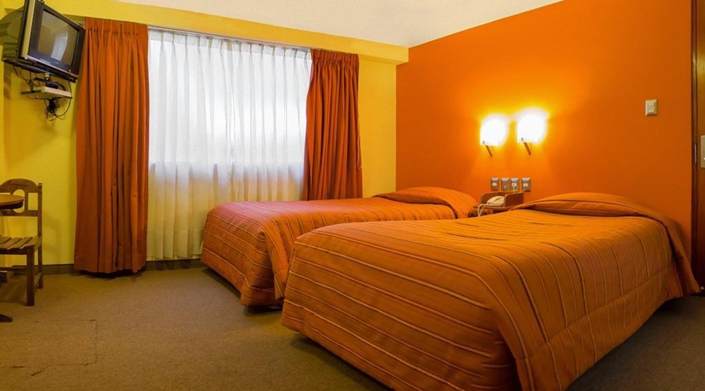 Mosoq Inn Puno Quarto foto