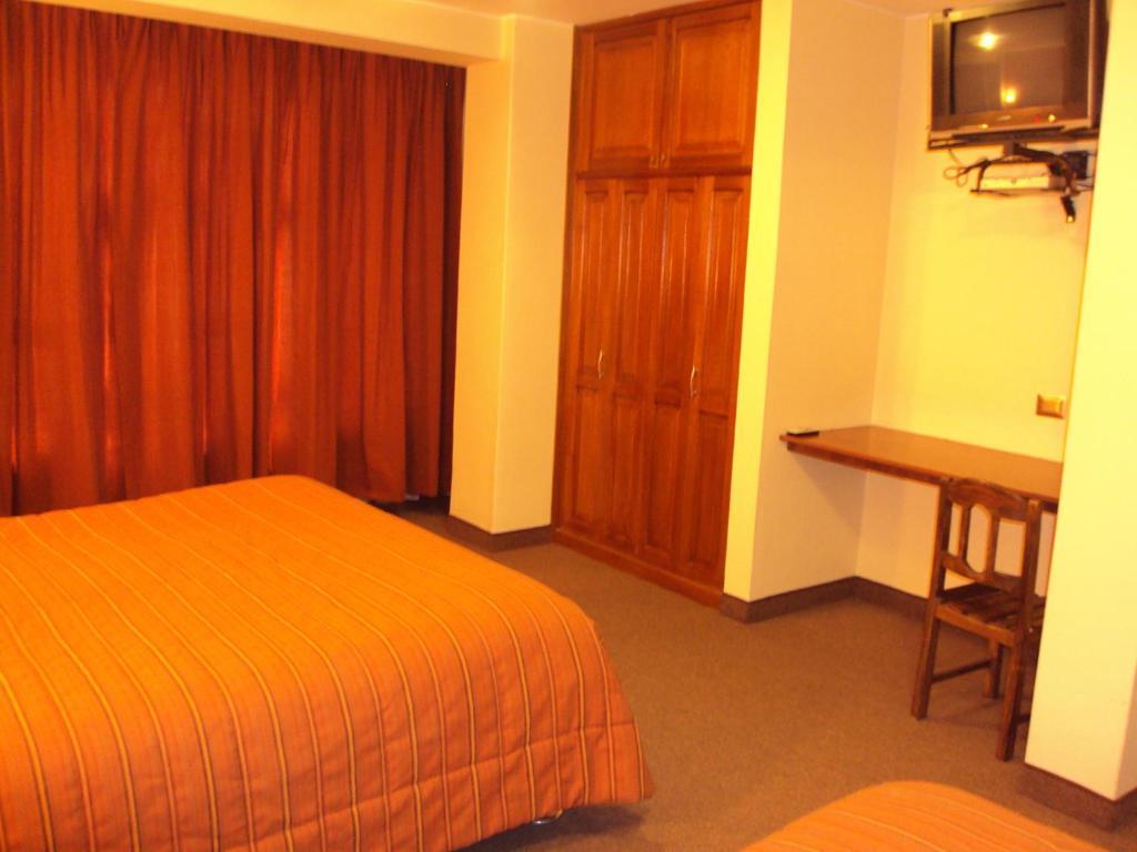 Mosoq Inn Puno Quarto foto