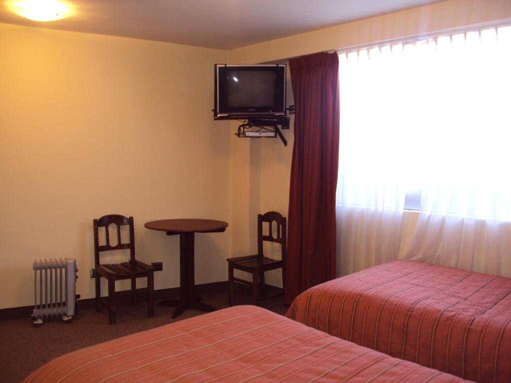 Mosoq Inn Puno Quarto foto