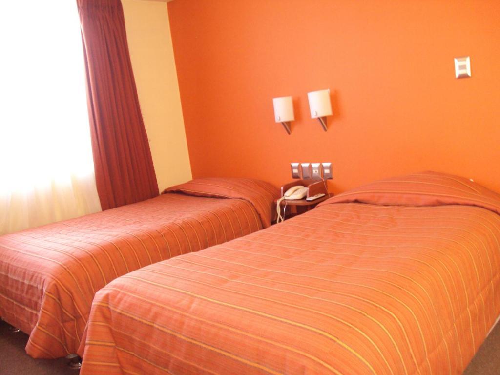 Mosoq Inn Puno Quarto foto