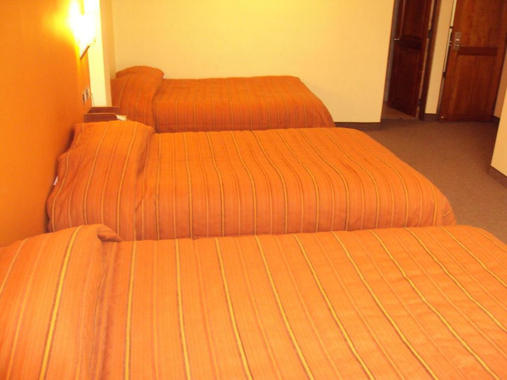 Mosoq Inn Puno Quarto foto